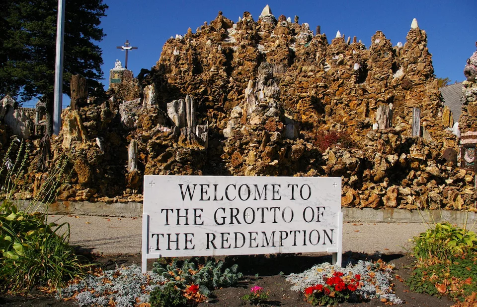 Sign that says "Welcome to the Grotto of the Redemption" in front of the Grotto of the Redemption in West Bend, Iowa