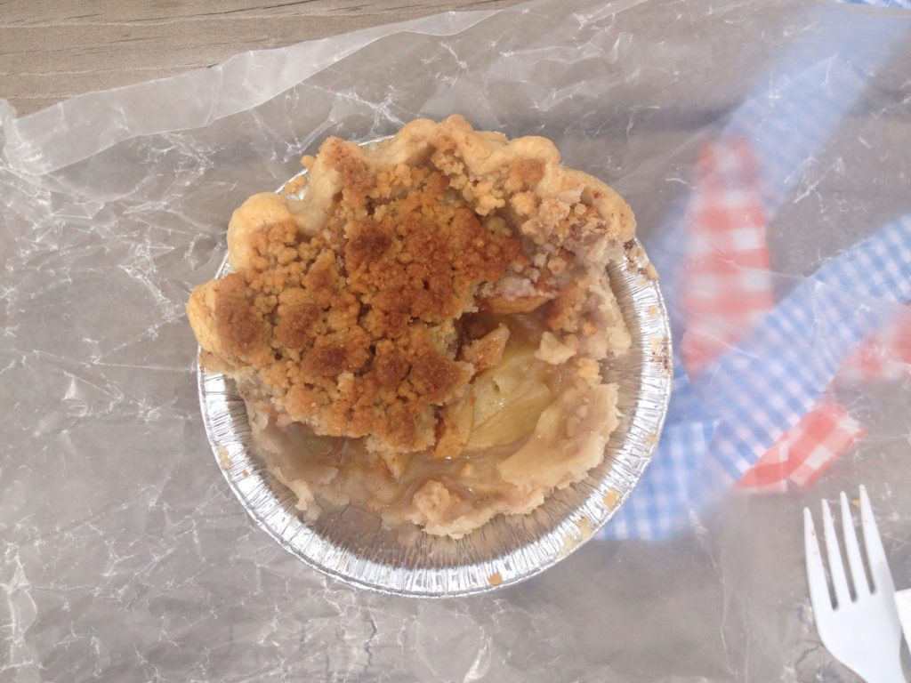 Half eaten apple crumble pie from the Pitchfork Pie Stand at the American Gothic House in Eldon, Iowa