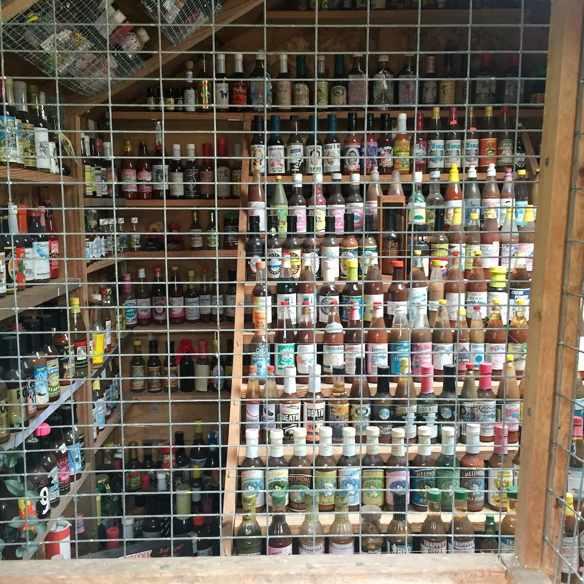 Collection of hot sauces in the Hot Sauce House at the Abita Mystery House in Abita Springs, Louisiana