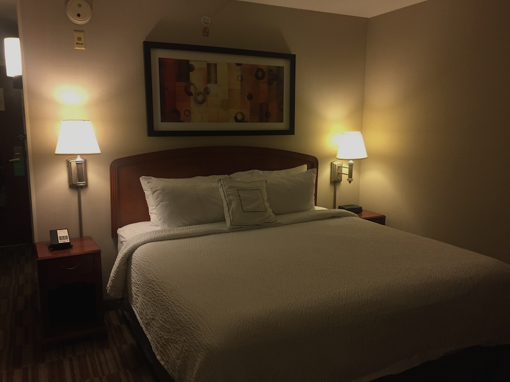 Bed and side tables at Minneapolis St. Paul / Roseville Courtyard Marriott in Roseville, Minnesota