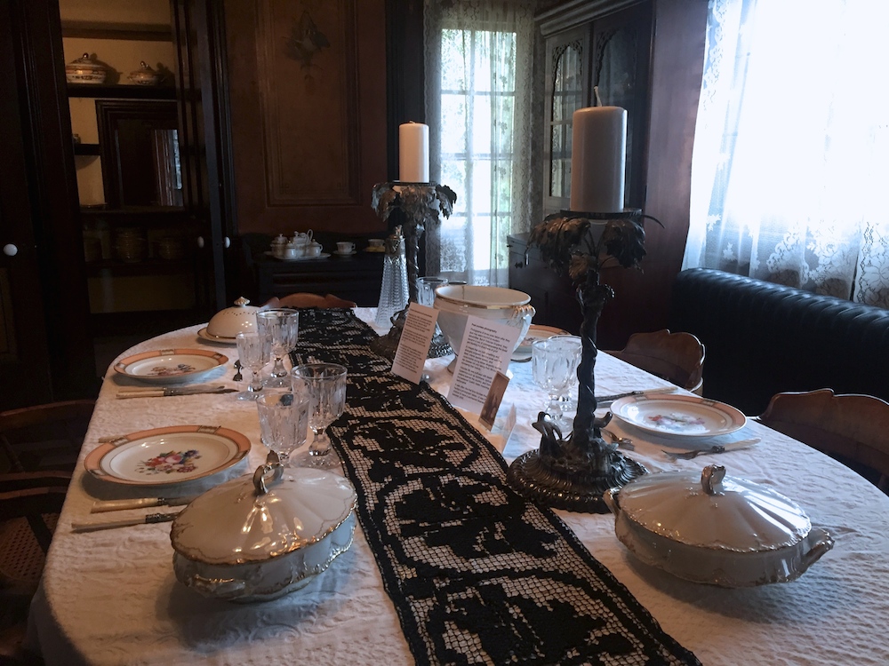 Historic table setting in the dining room of the historic Tinker Swiss Cottage in Rockford, Illinois