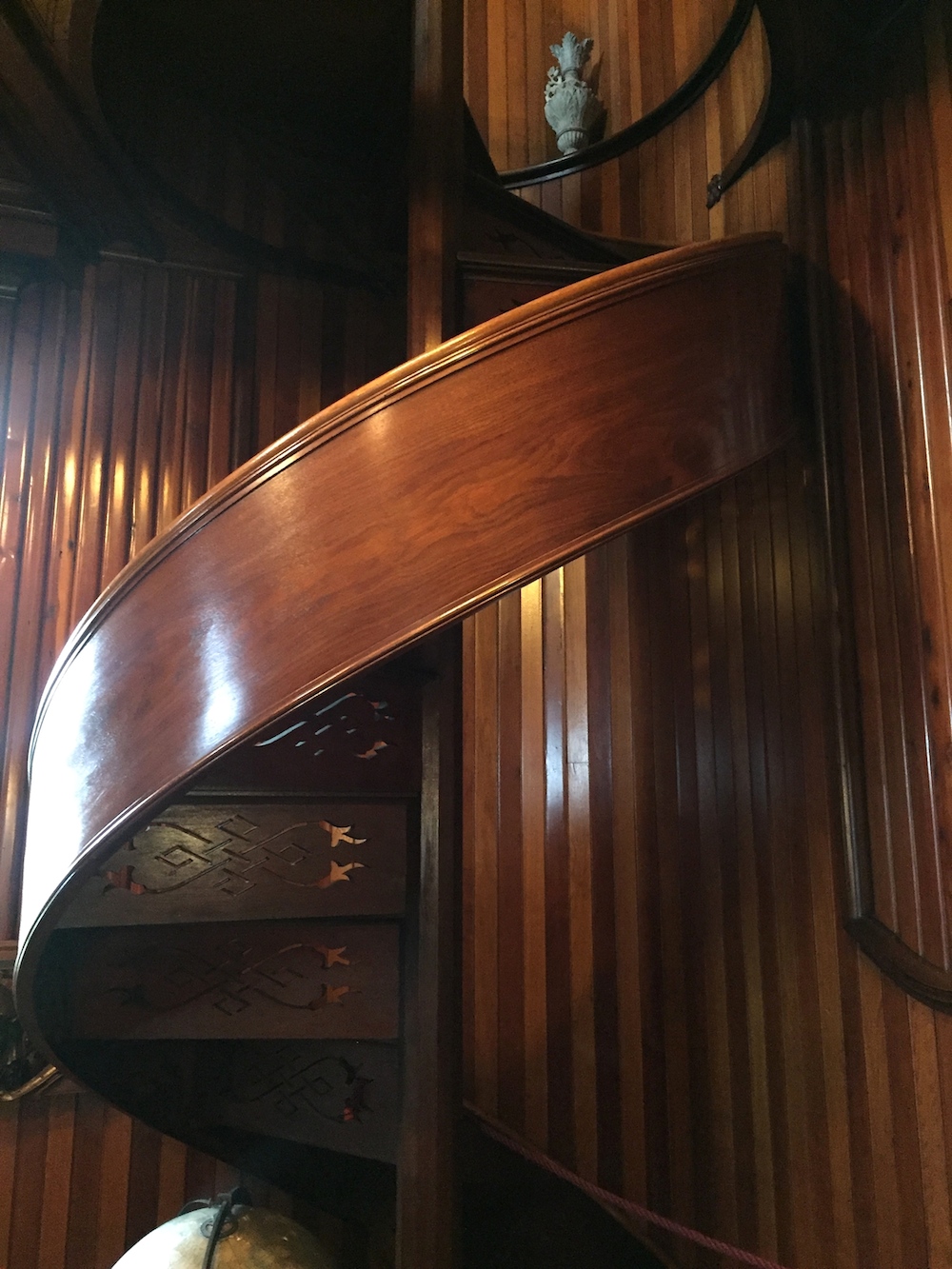Spiral staircase in the library of the historic Tinker Swiss Cottage in Rockford, Illinois