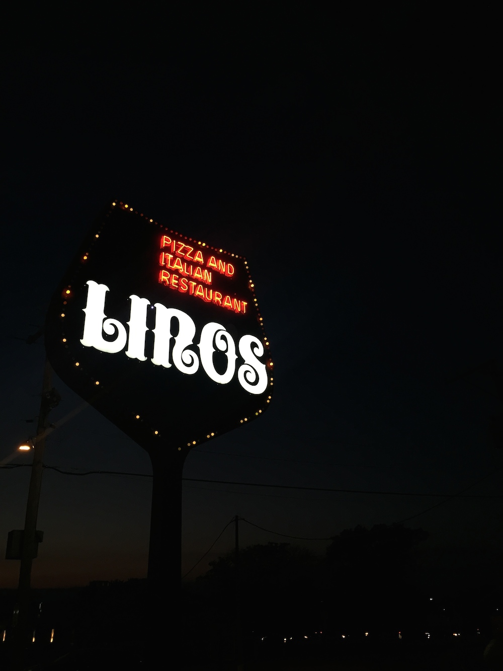 Exterior neon sign at Lino's in Rockford, Illinois