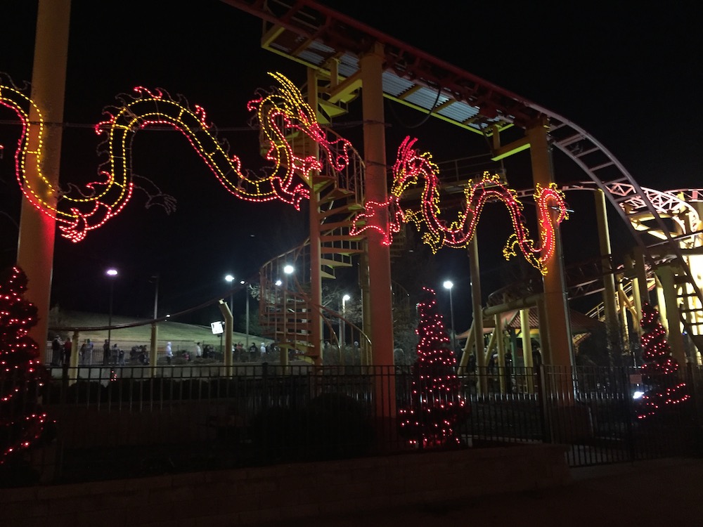 Holiday decorations on the Spinning Dragons roller coaster at Worlds of Fun's WinterFest in Kansas City, Missouri