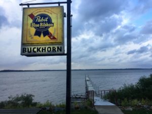 Directional sign along the lakefront for the Buckhorn Supper Club in Milton, Wisconsin