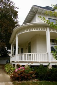 Wraparound porch of a home in the Courthouse Hill Historic District of Janesville, Wisconsin