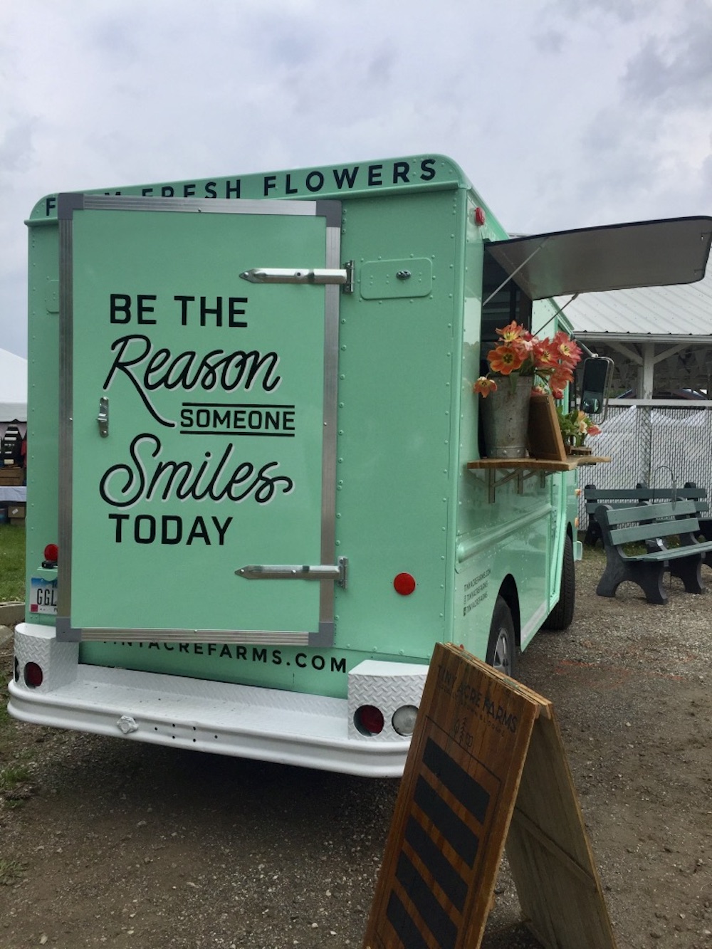 Teal Tiny Acre Farms flower truck at the Vintage & Made Fair in Adel, Iowa