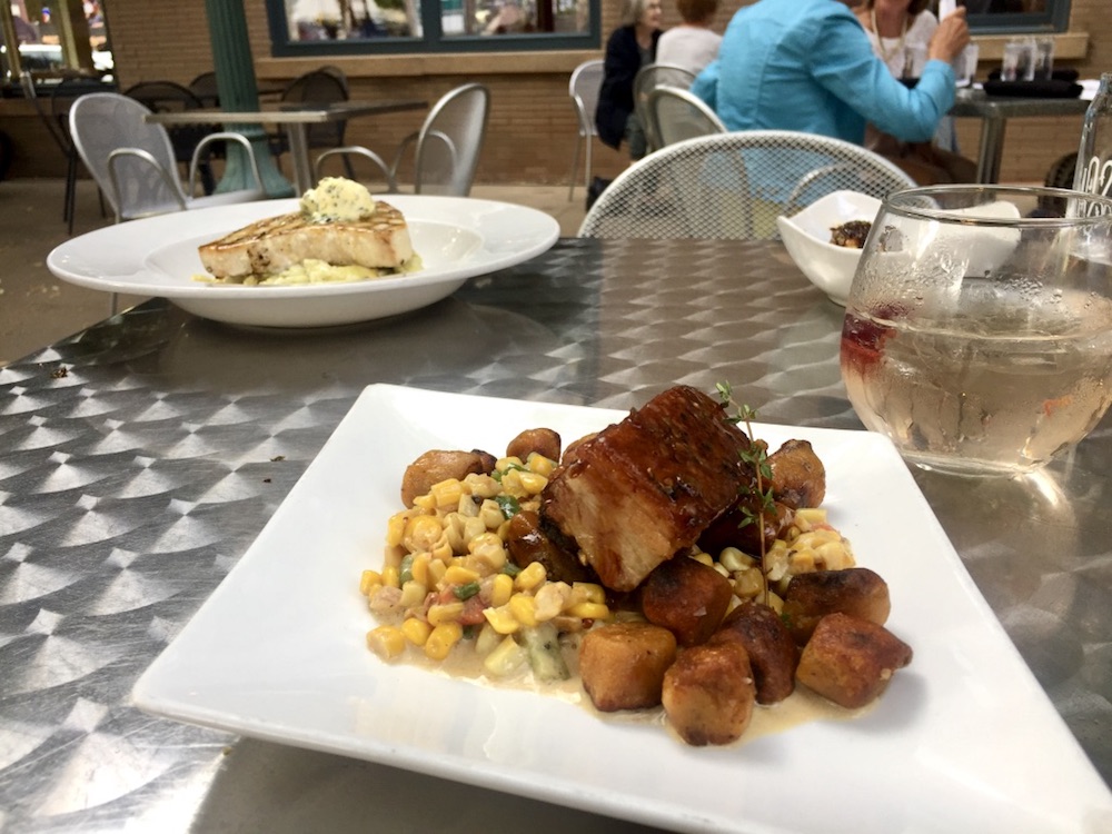 Braised pork belly and seared salmon alongside summer sangria at Bros Brasserie in Sioux Falls, South Dakota