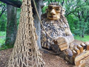 Giant wooden troll with a net at the Morton Arboretum Troll Hunt in Lisle, Illinois