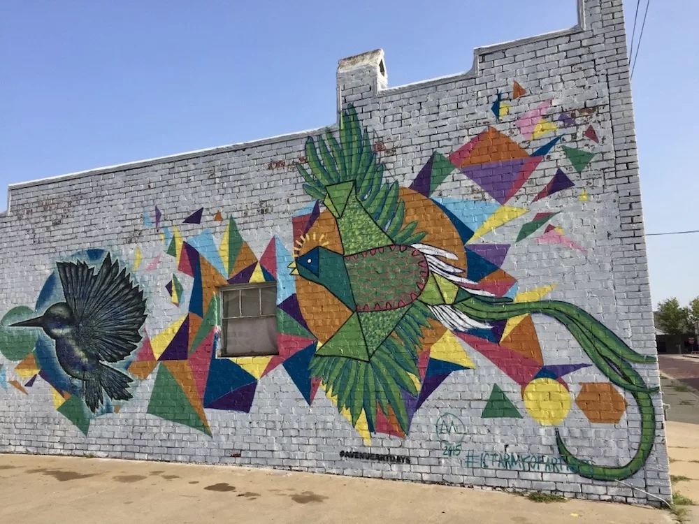 Colorful geometric mural with birds in the Douglas Design District in downtown Wichita, Kansas