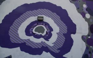 Purple brain shapes mural in the Douglas Design District of Wichita, Kansas