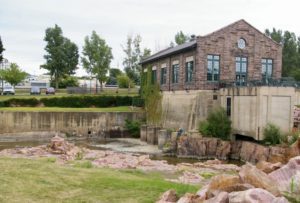 Exterior of Sioux Falls Light and Power Plant building that houses the Falls Overlook Cafe in Falls Park in Sioux Falls, South Dakota