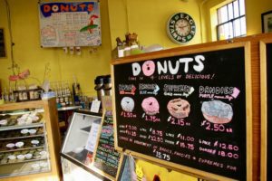 Handwritten sign of types of donuts at The Donut Whole in Wichita, Kansas