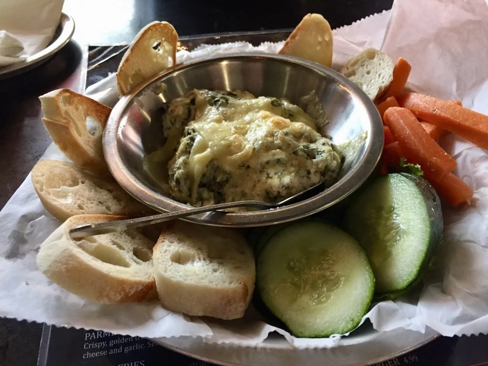 Spinach artichoke dip with bread and veggies at Norton Brewing Company in Wichita, Kansas
