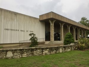 Concrete exterior with arched columns at the Greyhound Hall of Fame in Abilene, Kansas