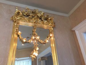 Gold plated mirror with lights at Seelye Mansion in Abilene, Kansas