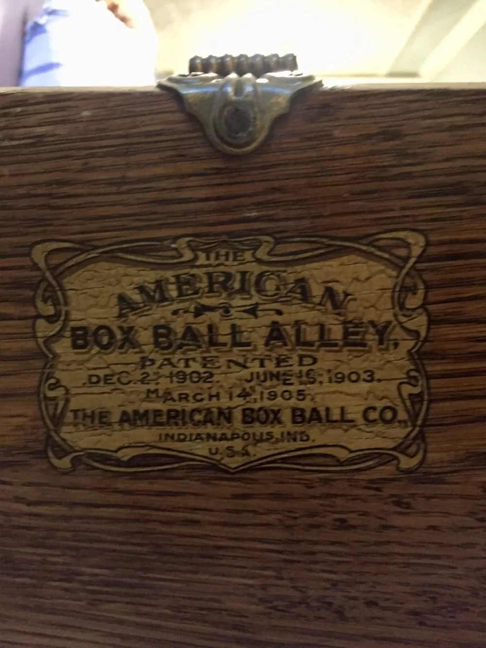 Seal on a wooden box ball bowling alley in the basement of the Seelye Mansion in Abilene, Kansas