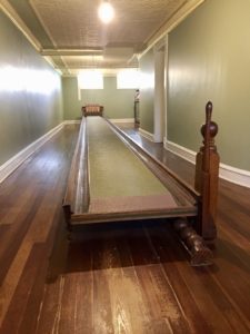 Wooden box ball bowling alley in the basement of the Seelye Mansion in Abilene, Kansas