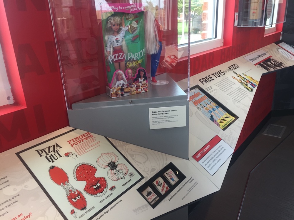 Pizza Hut Barbie and vintage advertisements at the Pizza Hut Museum on the Wichita State University campus in Wichita, Kansas