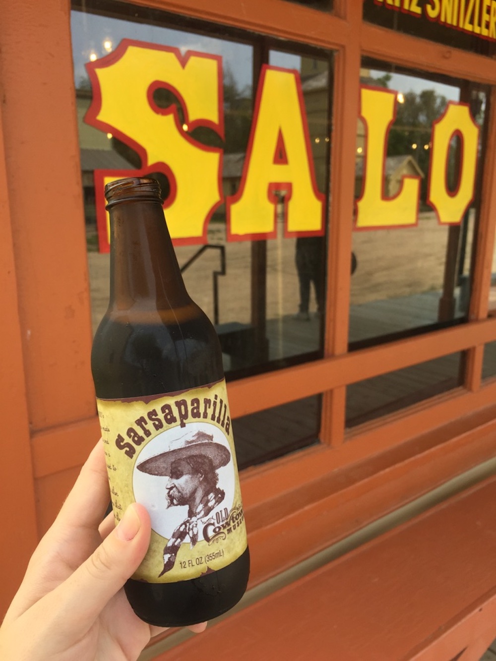 Bottle of sarsparilla outside of the Saloon at Old Cowtown Museum in Wichita, Kansas