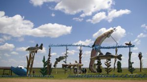 Large metal sculptures of fish jumping along the Enchanted Highway near Regent, North Dakota
