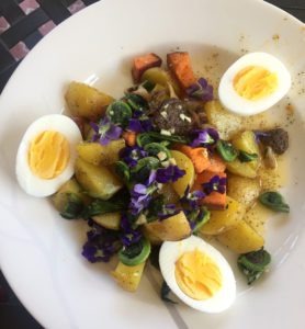 Warm root vegetable salad with hard boiled eggs and morel mushrooms at Thistle's Summit in Mount Vernon, Iowa