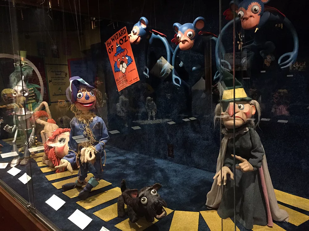 Seven Wizard of Oz themed marionette puppets made by Bil Baird on display at the Charles H. MacNider Art Center in Mason City, Iowa