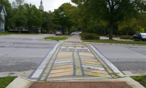 Crosswalk painted with Frank Lloyd Wright inspired design in Mason City, Iowa