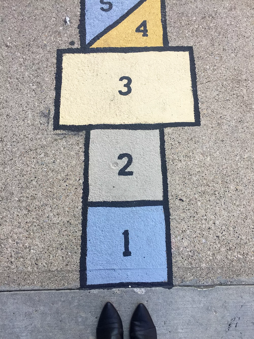 Painted hopscotch inspired by Frank Lloyd Wright in Mason City, Iowa