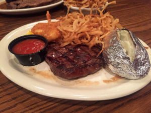 Steak and onion rings at Maxie's Restaurant and Lounge in Des Moines, Iowa