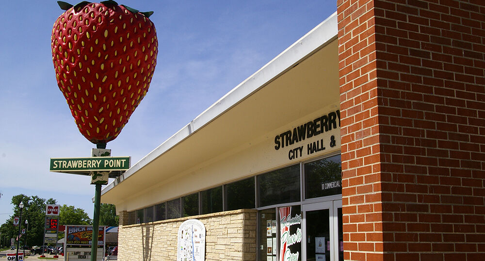 Sculpture of the World's Largest Strawberry outside of city hall in Strawberry Point, Iowa
