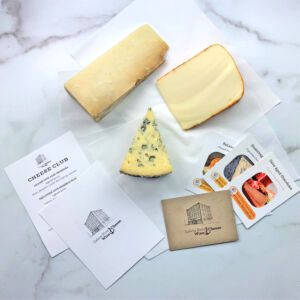 Cheese and informational cards from Galena River Wine & Cheese's monthly Cheese Club box