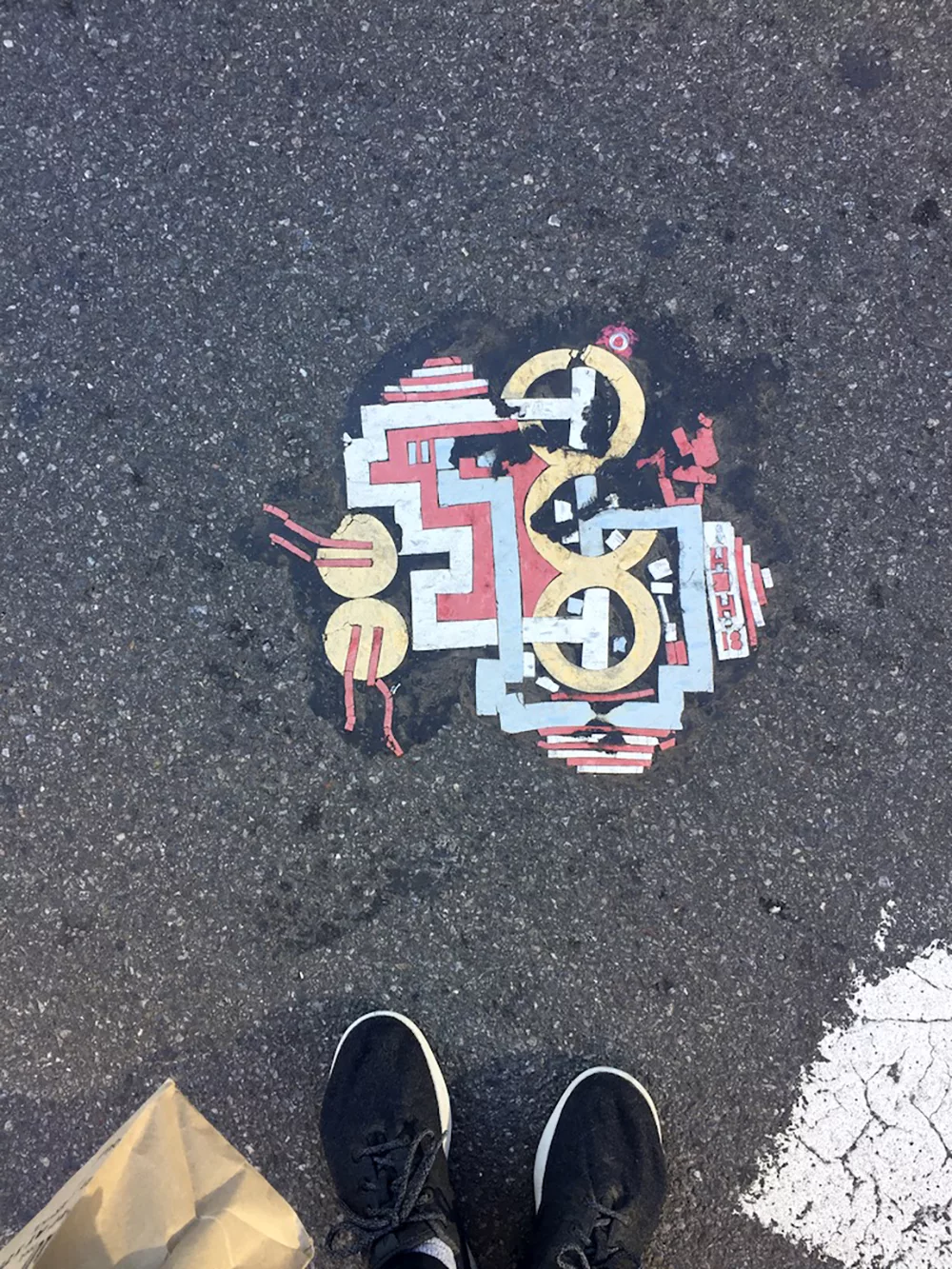 Pothole in New York City filled in with mosaic art