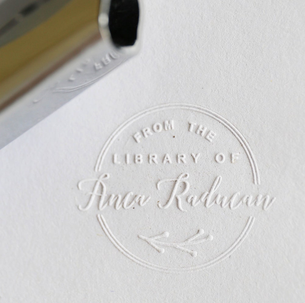 Example of personalized book embosser stamp on a page