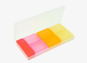Image of plastic red, pink, orange and yellow jewelry case