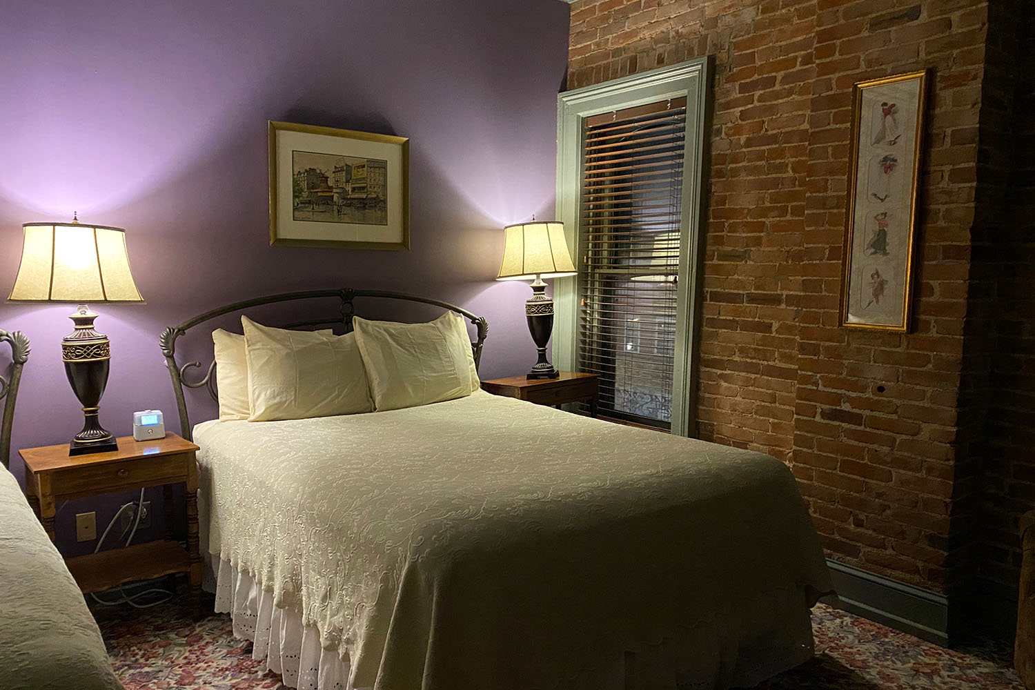 Bedroom in suite at The Black Hawk Hotel in Cedar Falls, Iowa