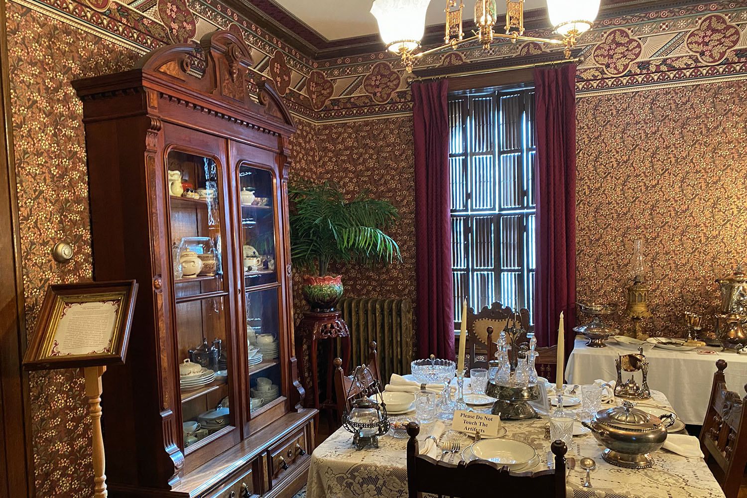 Ornate dining room display at the Victorian House Museum in Cedar Falls, Iowa