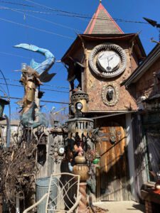 Clocktower with various sculptures at Gary Pendergrass' steampunk art installation in Wichita, Kansas