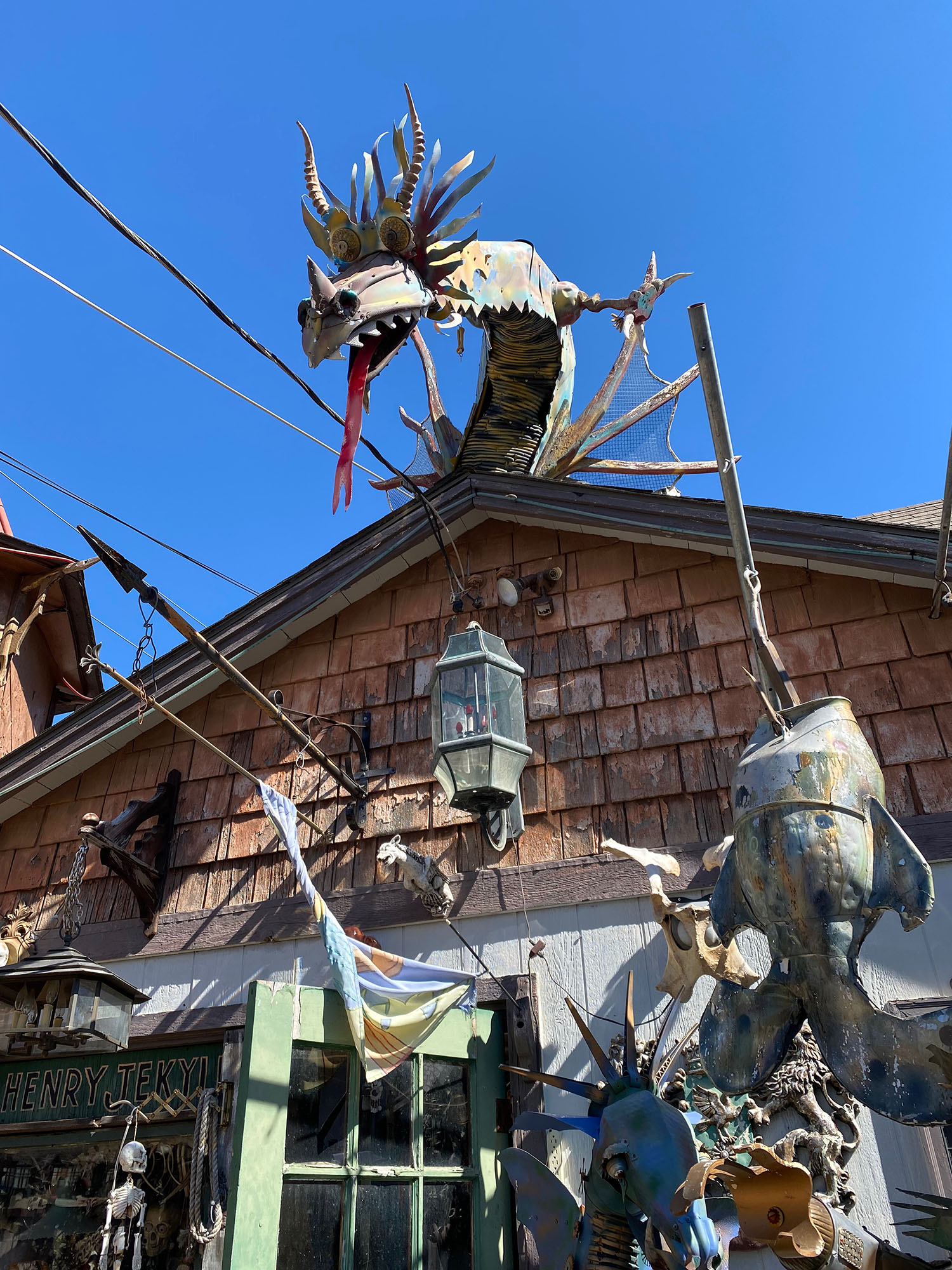 Sculpture of a dragon on top of a building at Gary Pendergrass' steampunk art installation in Wichita, Kansas