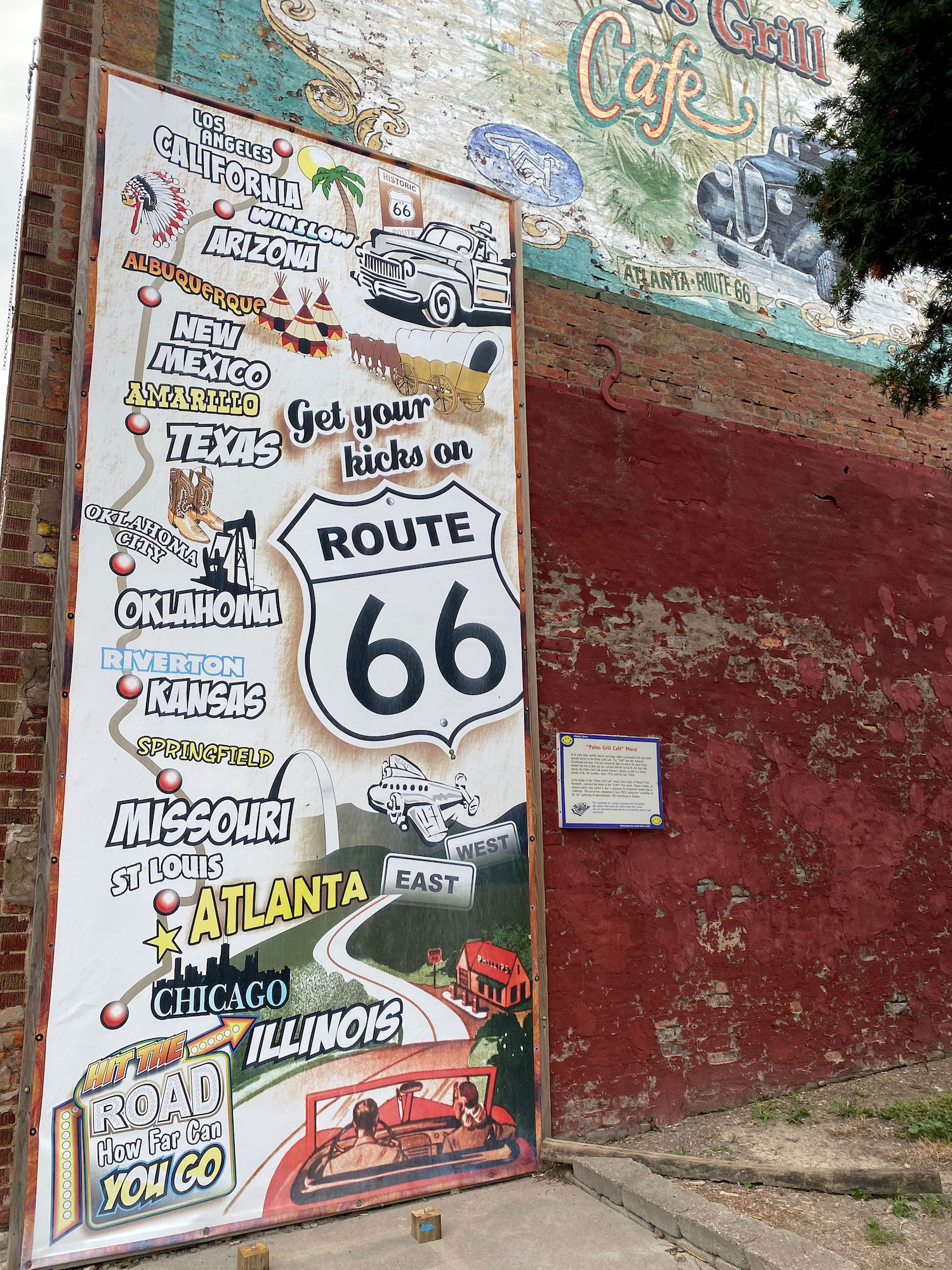 Illustrated Route 66 map next to Paul Bunyon Hot Dog Muffler Man in Atlanta, Illinois