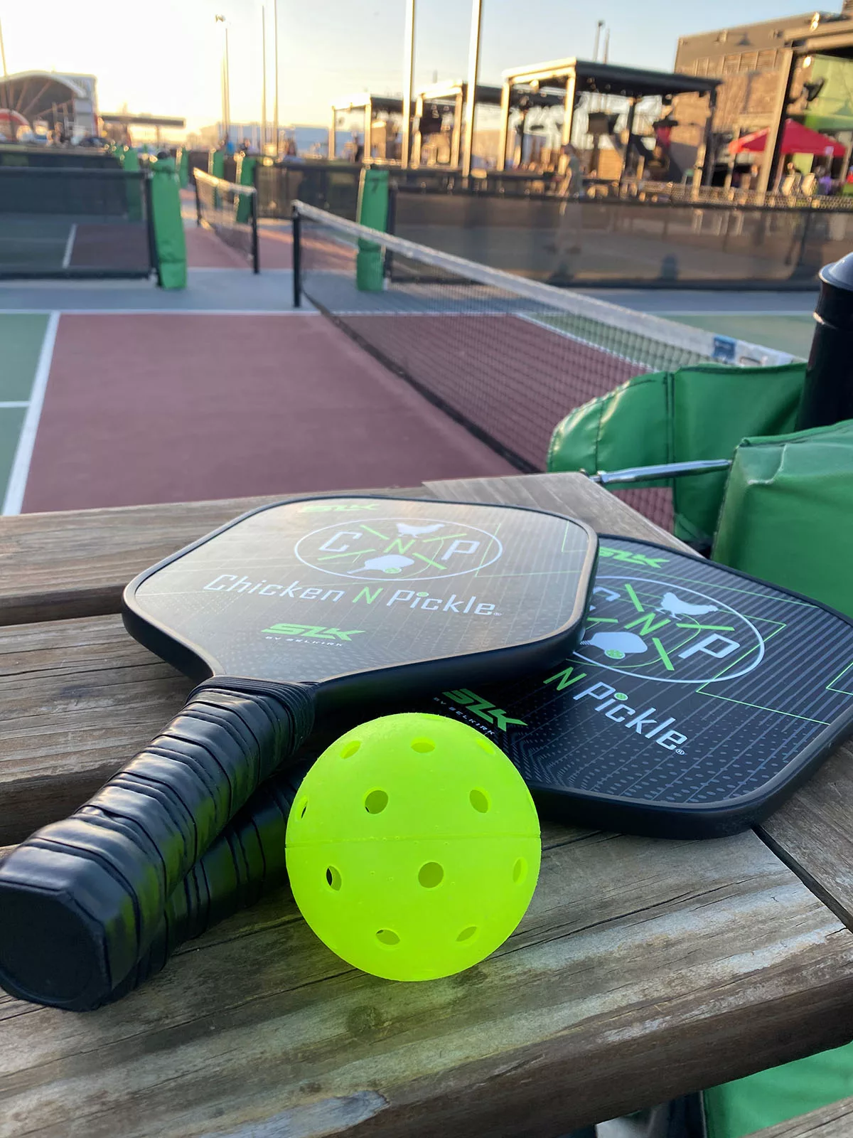 Pickle ball paddles and ball at Chicken N Pickle in Wichita, Kansas