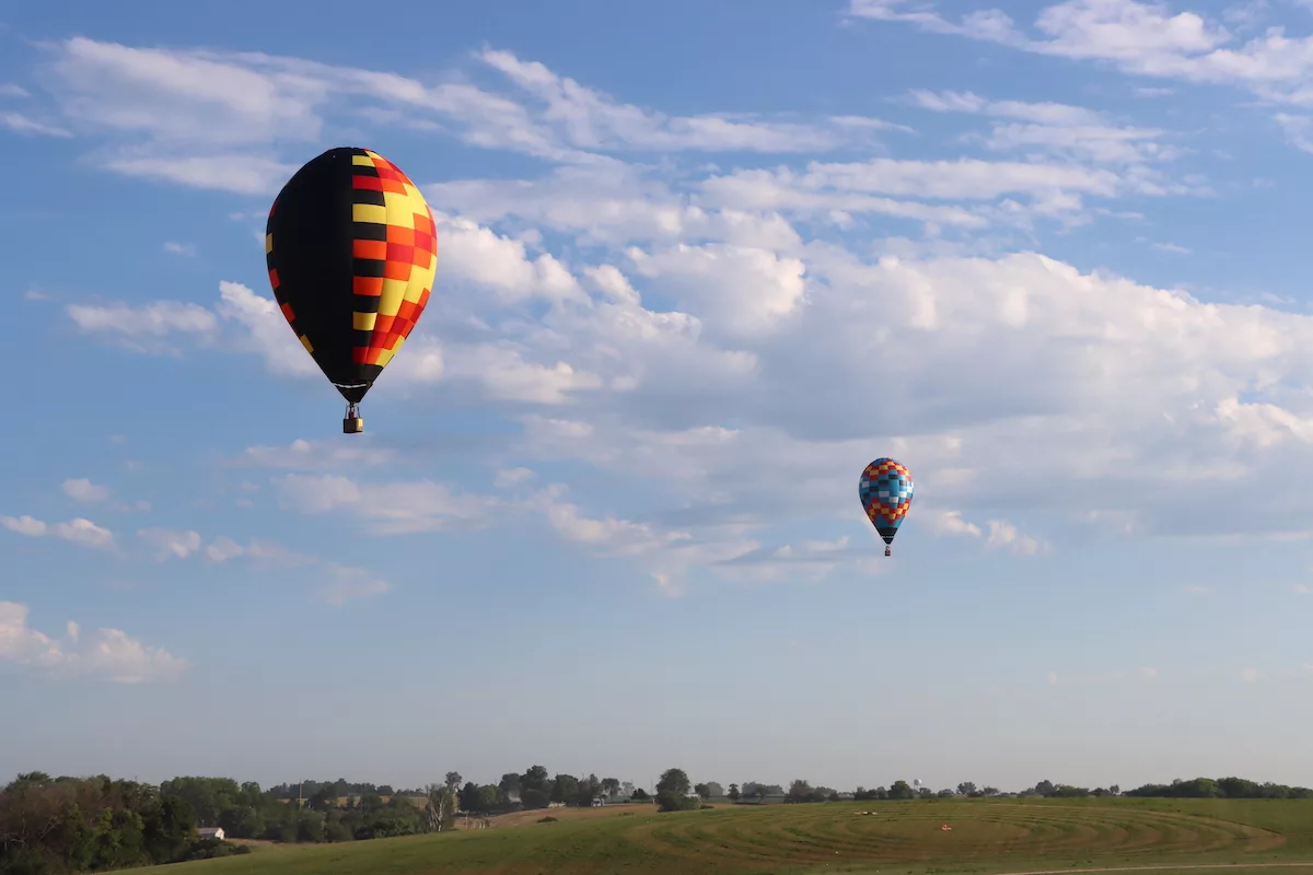 Hot air balloons in the sky over Indianola, Iowa during the National Balloon Classic