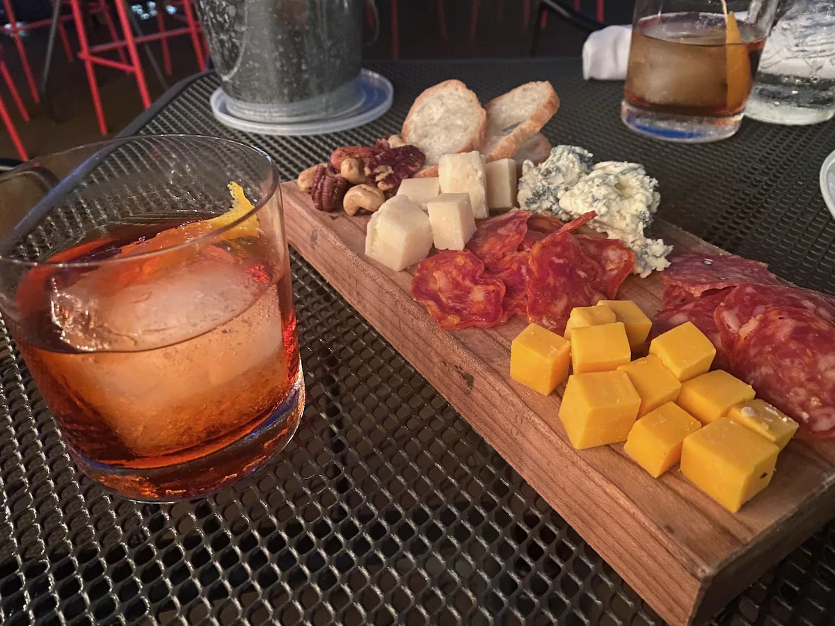 Cocktails and charcuterie board at Genisa Wine Bar in Janesville, Wisconsin