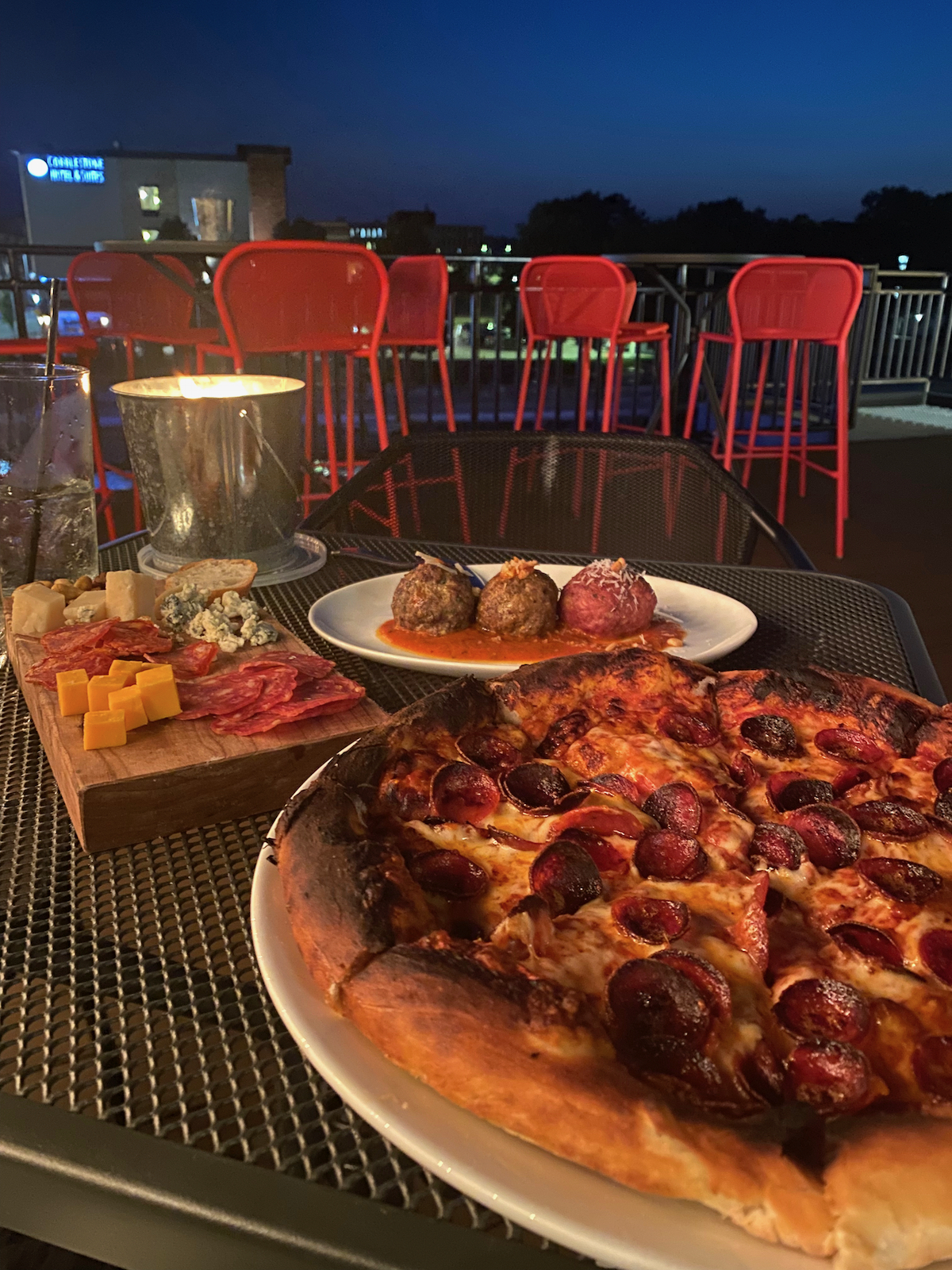 Pizza, meatballs and charcuterie board at Genisa Wine Bar in Janesville, Wisconsin