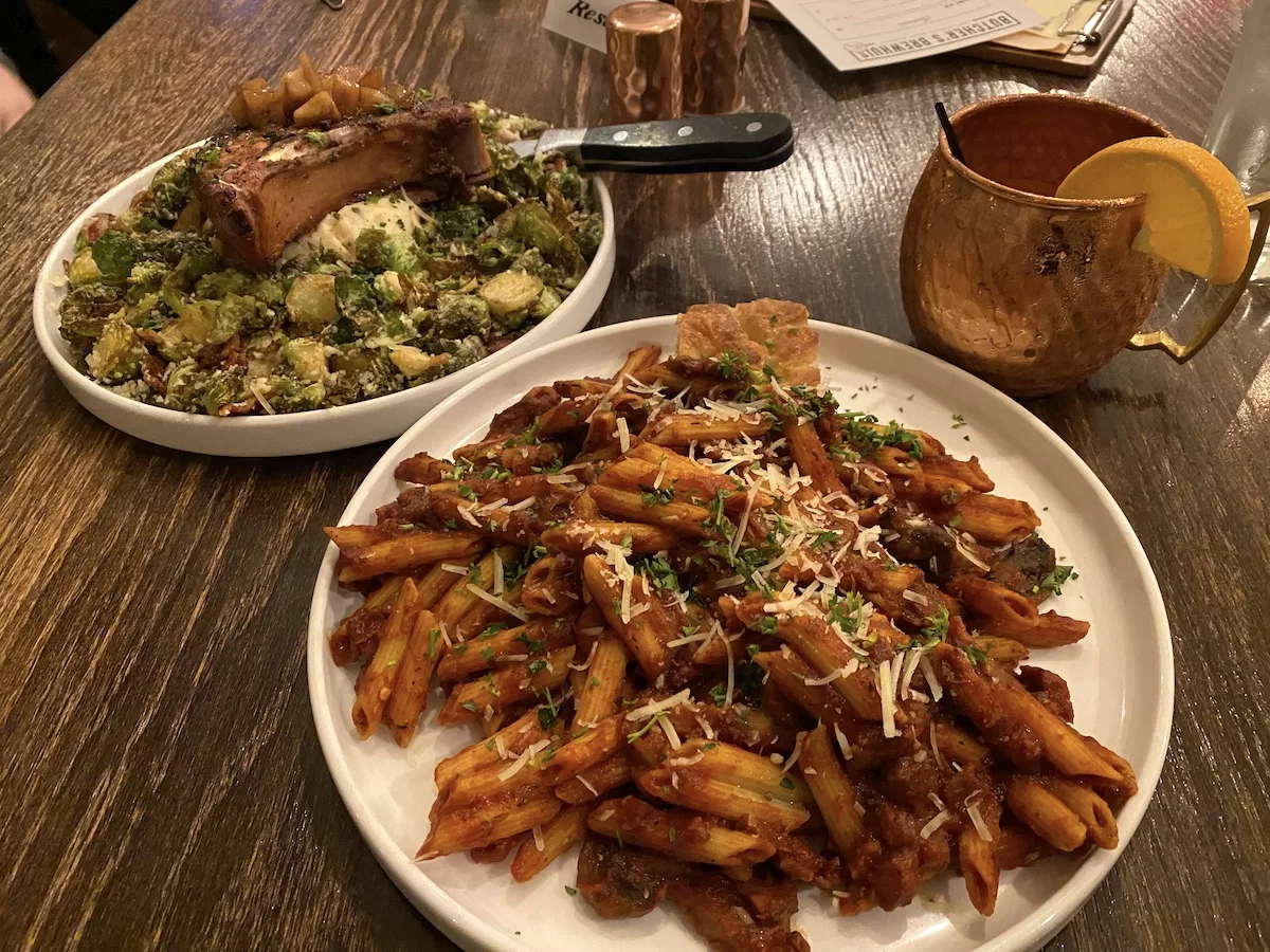 Pasta and pork chop entrees at Butcher's Brewhuis in Pella, Iowa