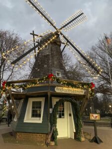 Mini windmill and visitor information center decorated for Christmas in Central Park in Pella, Iowa