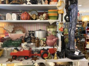 Shelf full of antiques at Boot Hill Antiques in Dodge City, Kansas
