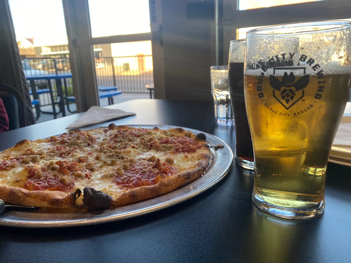 Pizza and pint of craft beer at the Dodge City Brewing Company in Dodge City, Kansas