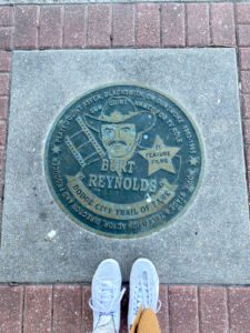 Trail of Fame medallion for Burt Reynolds along the Dodge City Trail of Fame in Dodge City, Kansas
