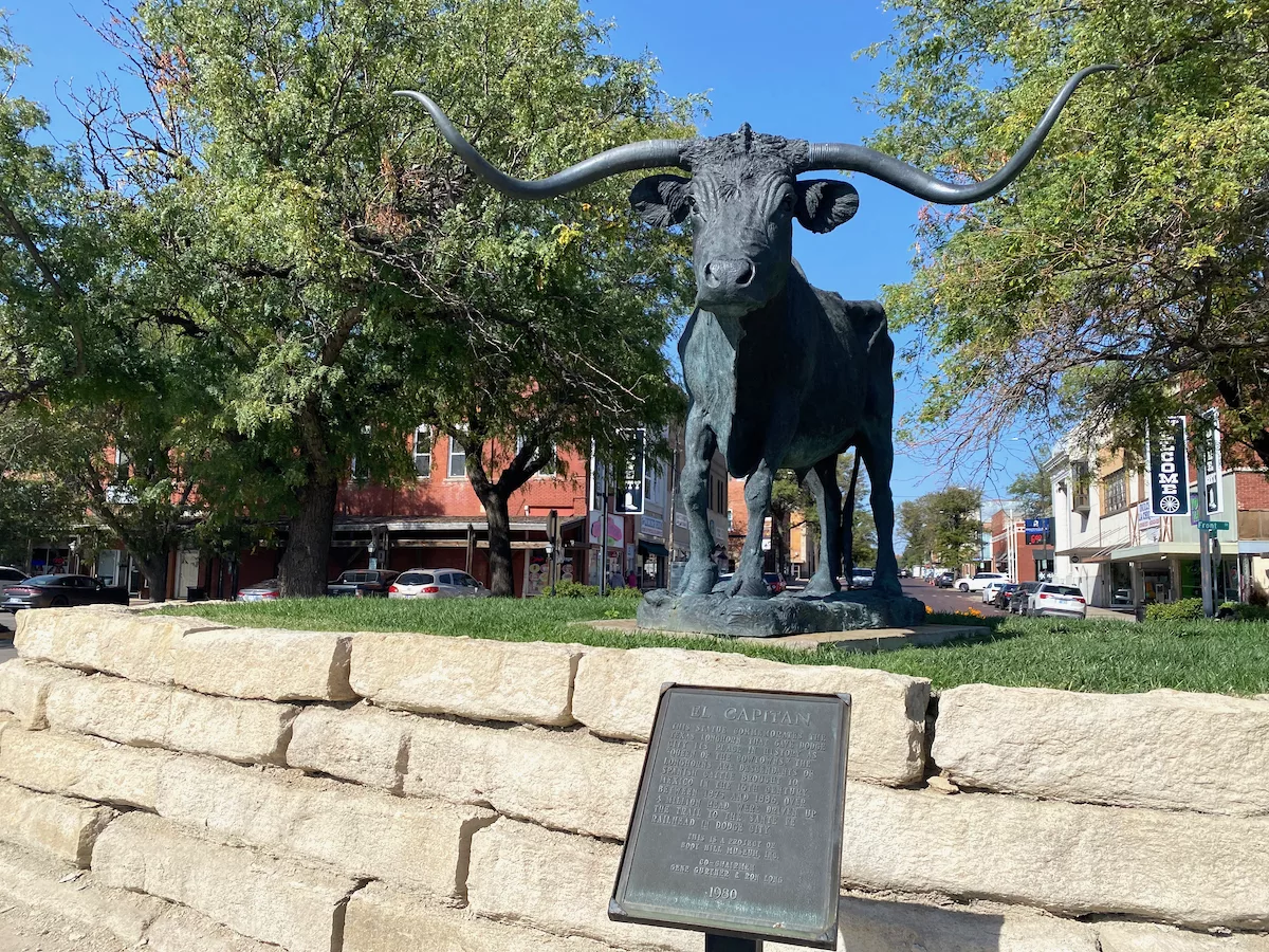 Statue of longhorn bull named El Capitan in downtown Dodge City, Kansas